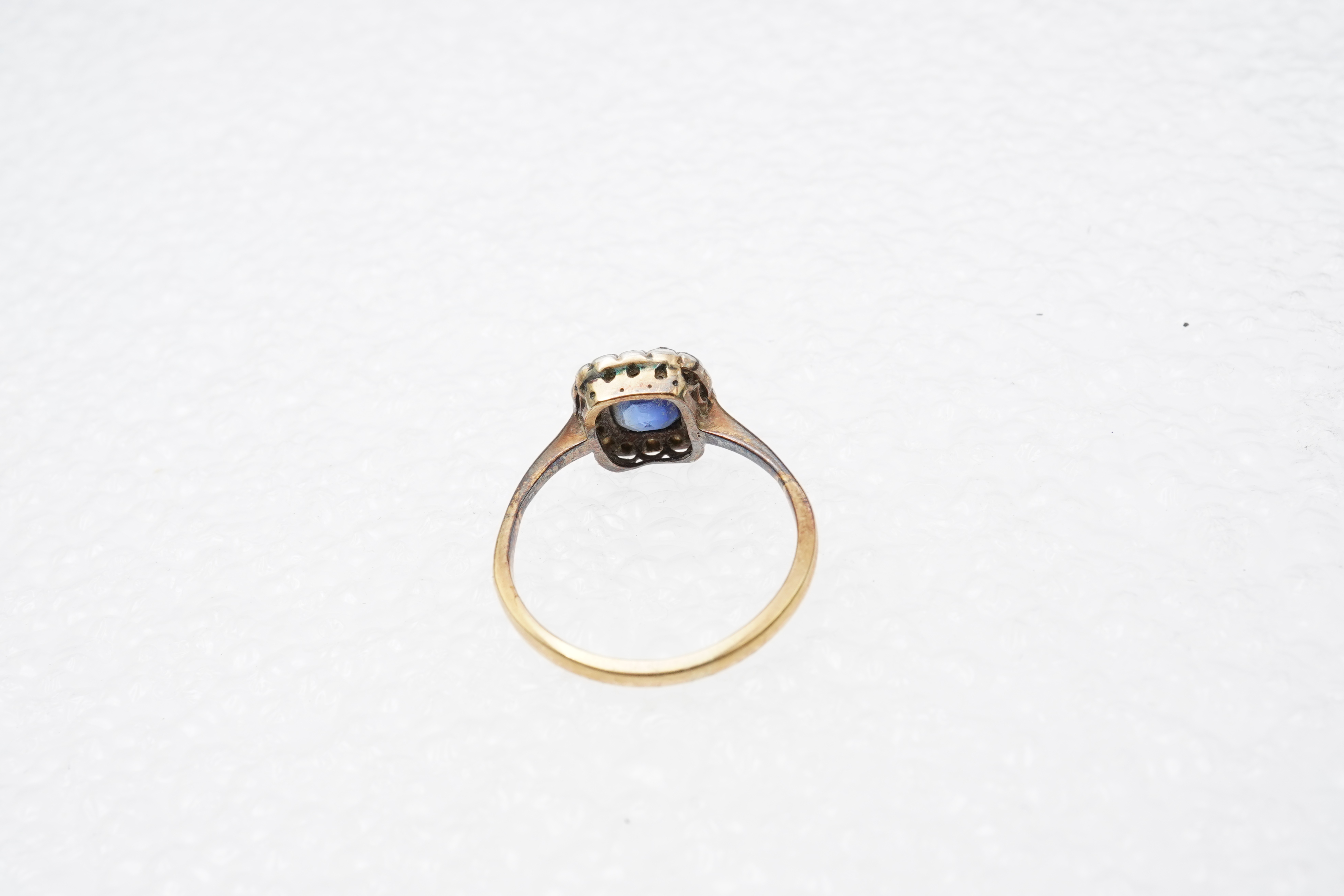 A sapphire and diamond cluster ring, early 20th century